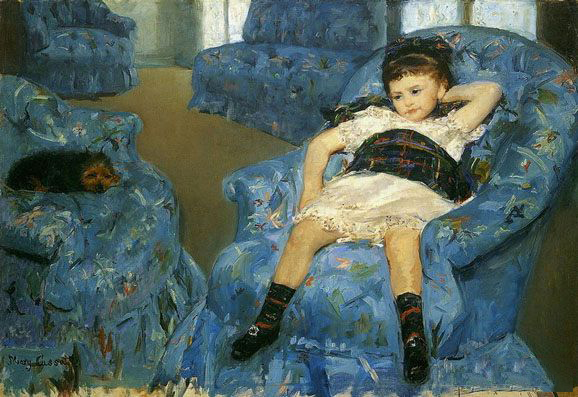 《皮蓝色沙发上的小女孩》